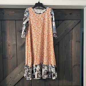 Girls Orange Floral A-Line Midi Dress with Patterned Sleeves